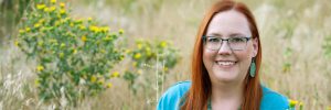 Sara Avery smiling in field